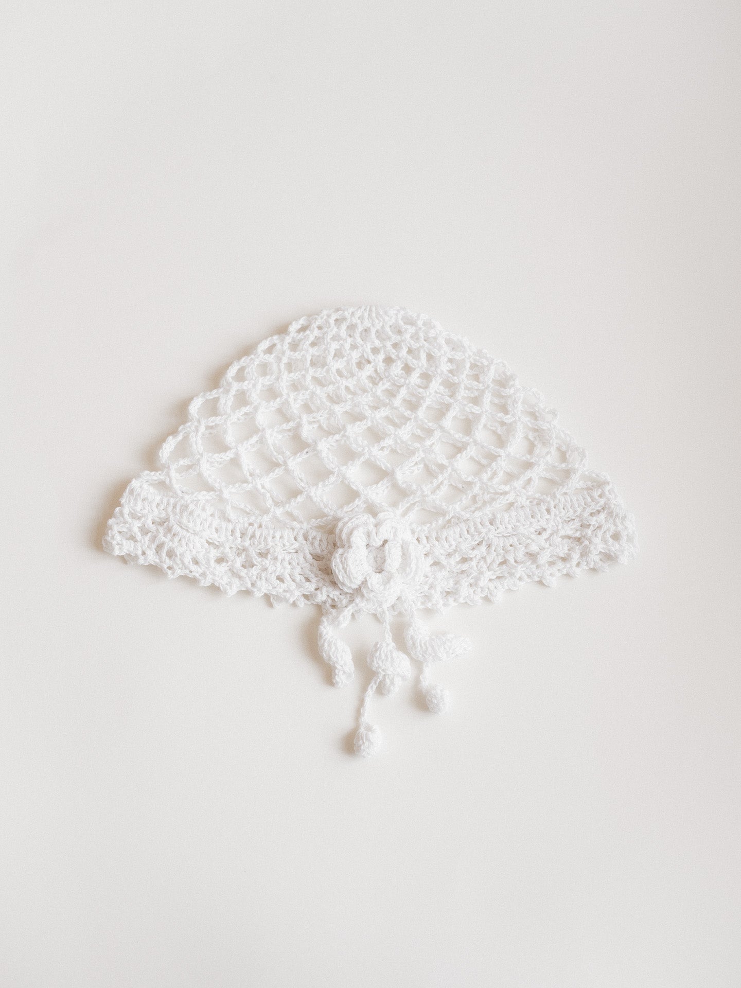 Lightweight lace-knit beanie with Flowers